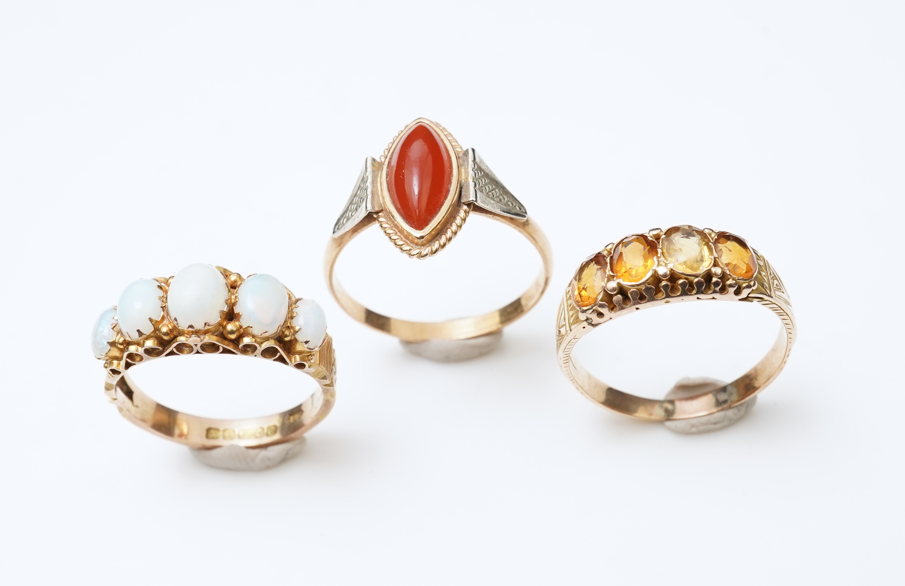 Three gem-set rings